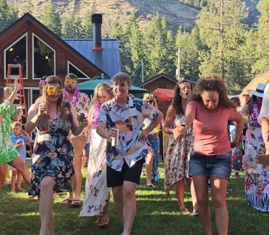 Line dancing at an outdoor event